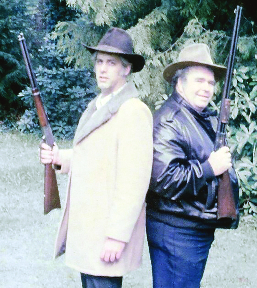 Mike and Hoyt Axton returned from a pawn shop, each with a 44-40 rifle.